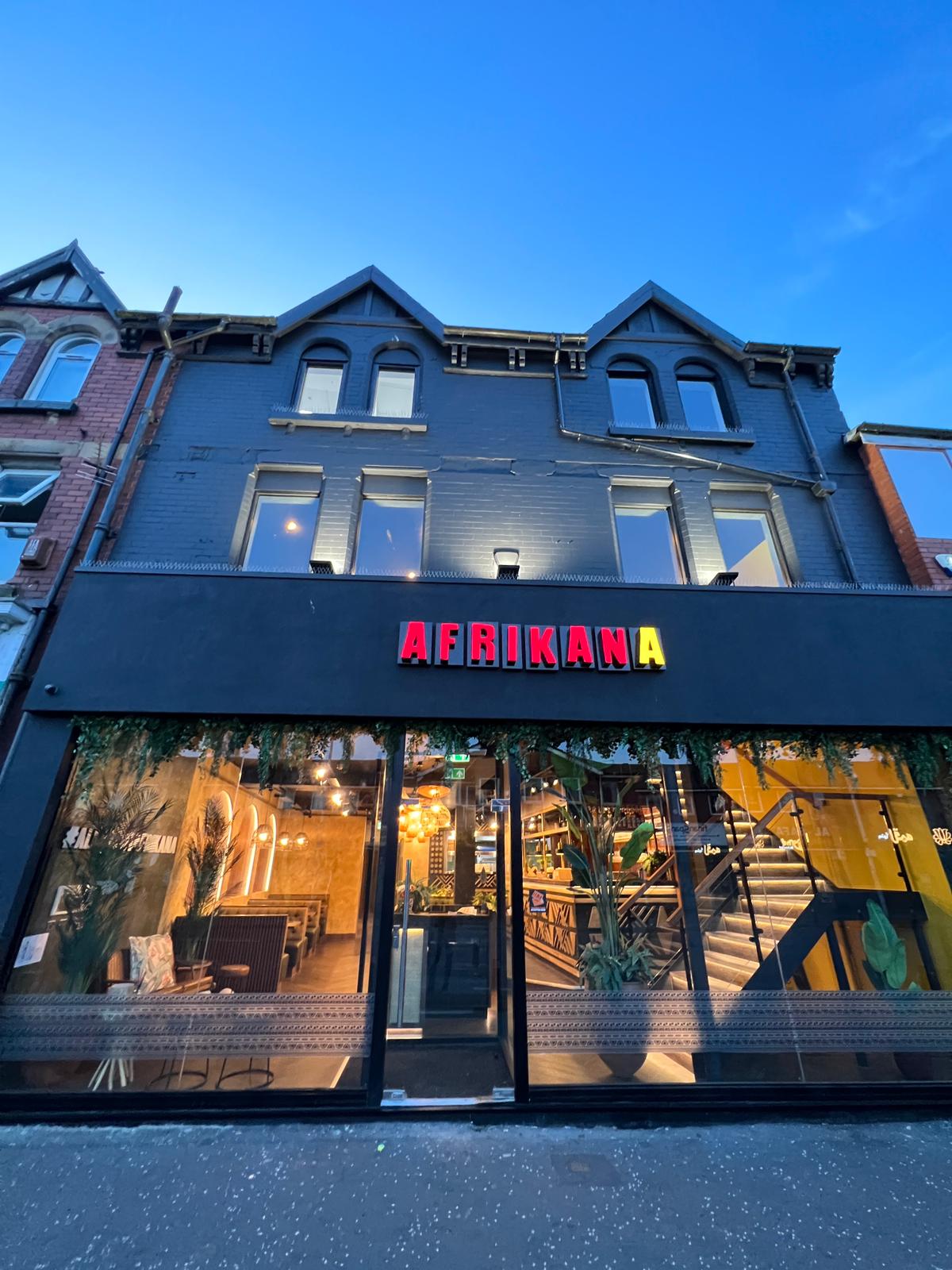 Afrikana shopfront at dusk